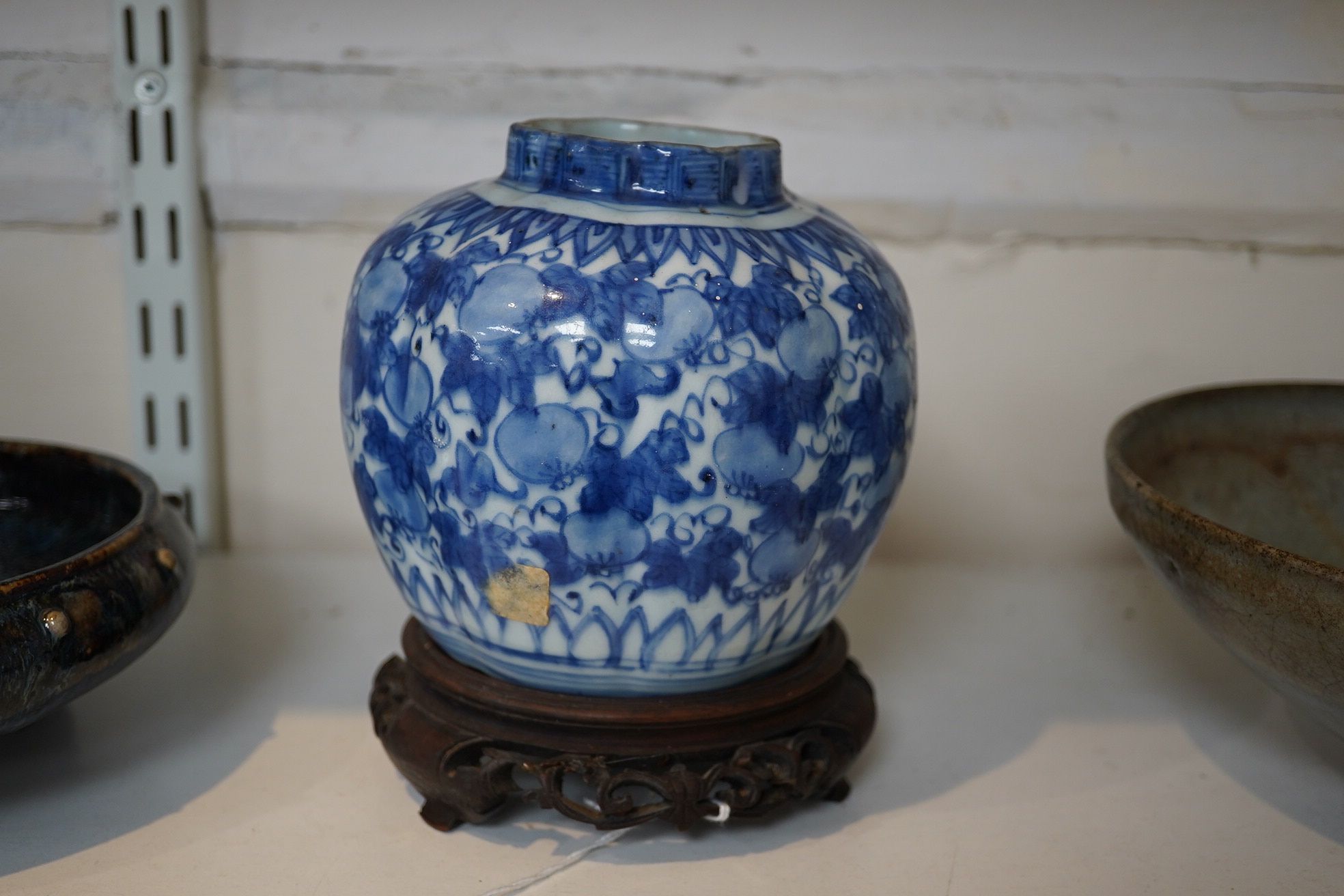 A Chinese blue and white ‘squirrel and vine’ melon-shaped jar, Wanli period (1572-1620)
